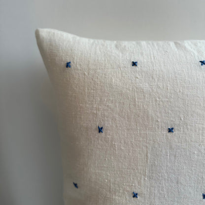 Handmade white linen cushion blue embroidery